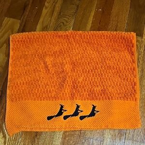 Orange and Black Halloween Hand Towel with Black Flying Witch Design